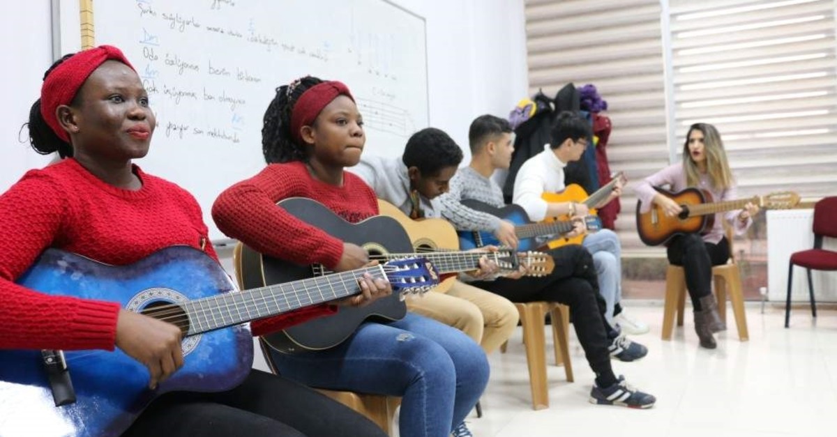 A group of foreign students attend music classes, Siirt, Jan. 5, 2020. (AA Photo) 