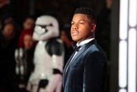 Actor John Boyega poses for photographers as he arrives for the European Premiere of 'Star Wars: The Last Jedi', at the Royal Albert Hall in central London, Britain, December 12, 2017. (Reuters Photo)