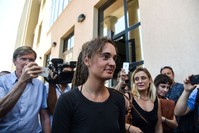 German captain of the Sea-Watch 3 Carola Rackete (C), who sparked international headlines by forcibly docking at an Italian port with rescued migrants, leaves the courthouse of the southern Sicilian town of Agrigento