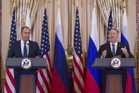 Russian Foreign Minister Sergey Lavrov, left, listens as Secretary of State Mike Pompeo speaks during a media availability, after their meeting at the State Department, Tuesday, Dec. 10, 2019, in Washington. (AP Photo)