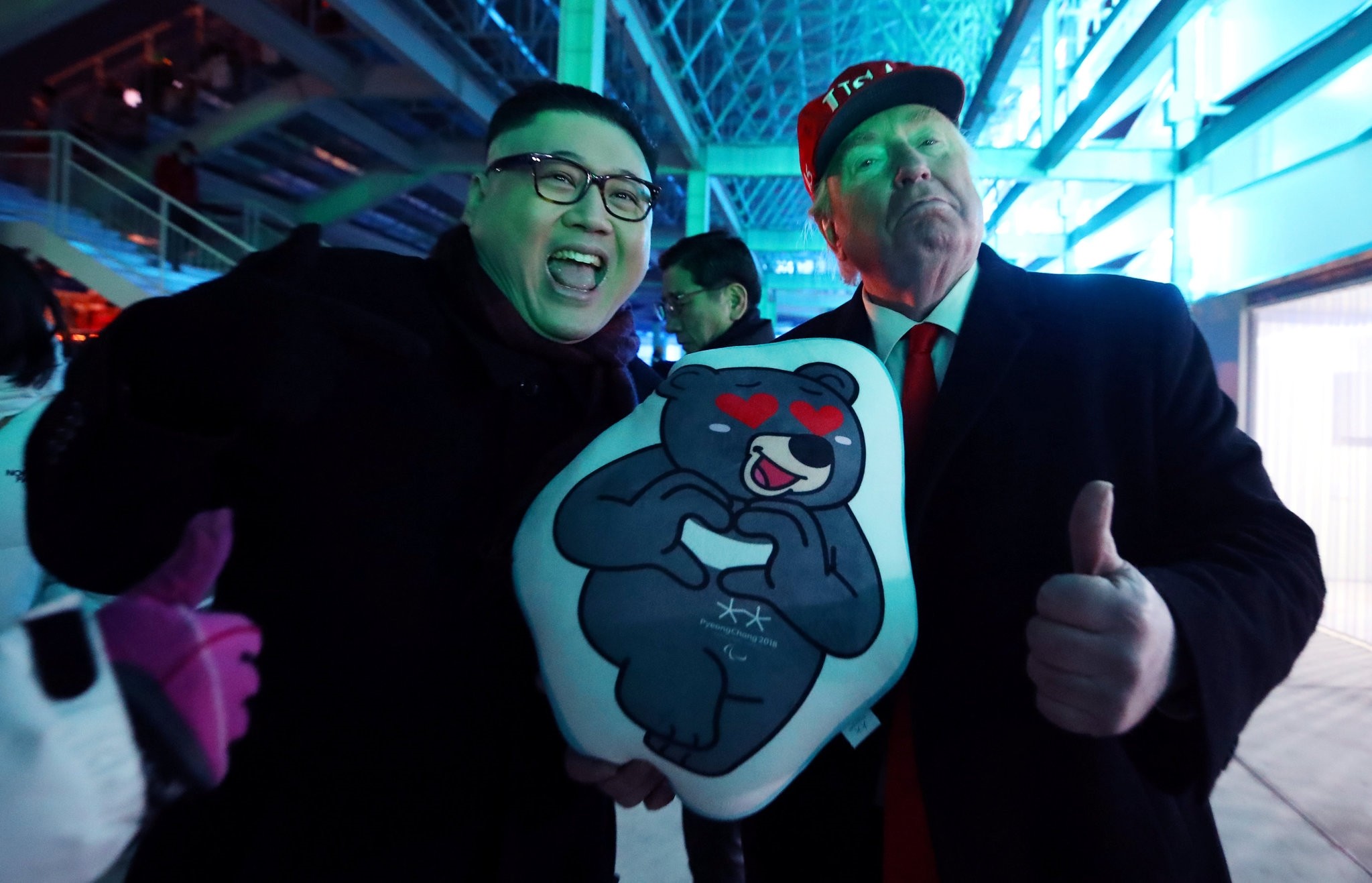 North Korean leader Kim Jong Un and U.S. President Donald Trump impersonators pose at the main stadium of the Pyeongchang Winter Olympic Games, Feb. 5. 