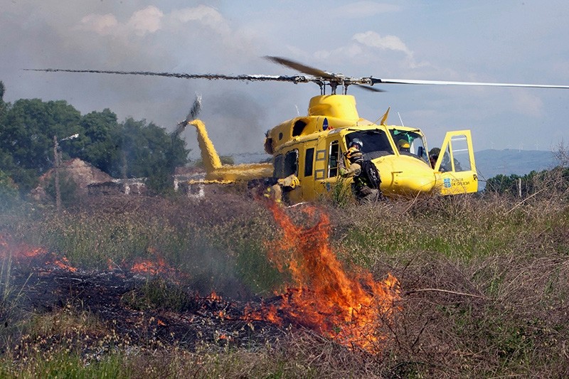 Firefighters try to extinguish a fire caused by the explosion of a storage room in a house where the owner kept pyrotechnic material in Tui, Galicia, northwestern Spain, May 23, 2018. (EPA Photo)
