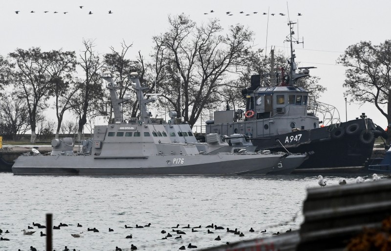 Three Ukrainian ships are seen as they docked after being seized by Russia on Sunday, Nov. 25, 2018, in Kerch, Crimea, Monday, Nov. 26, 2018. (AP Photo)