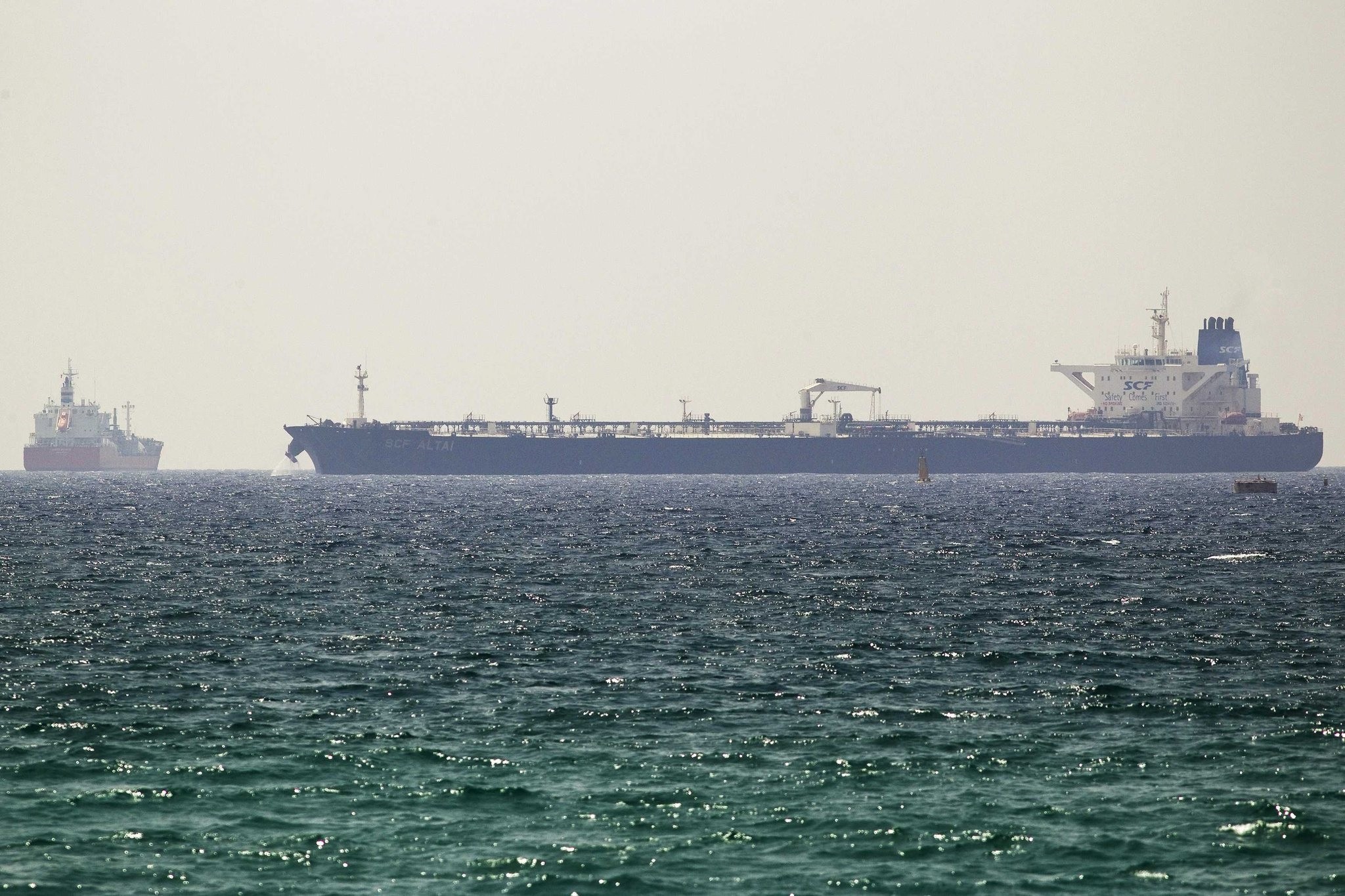 The SCF Altai tanker (R) docks near Israel's Ashkelon port June 20, 2014. (REUTERS Photo)