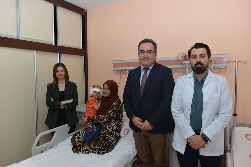 Syrian three-year-old Mervan Zugahi was fitted with two u201ccochlear implantsu201d in Hatayu2019s Mustafa Kemal University Health Practice and Research Hospital. (Anadolu Agency Photo)