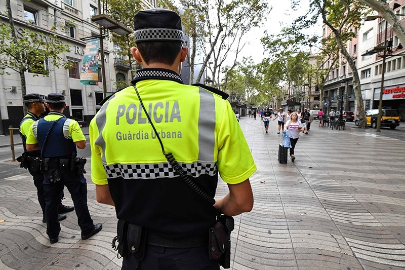 Police officers stand guard on the Las Ramblas boulevard in Barcelona on August 19, 2017, two days after a van ploughed into the crowd (AFP Photo)