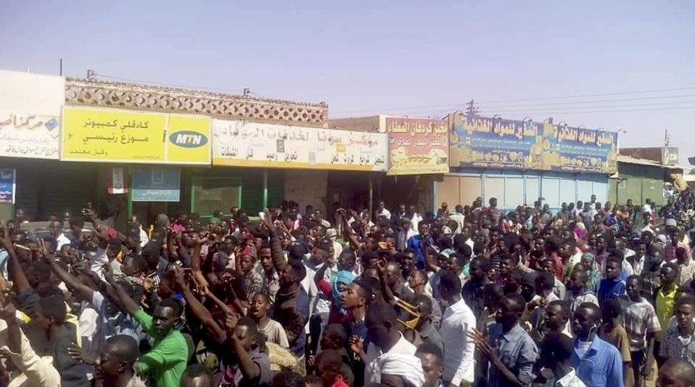 People chant slogans during a demonstration, Kordofan, Dec. 25.