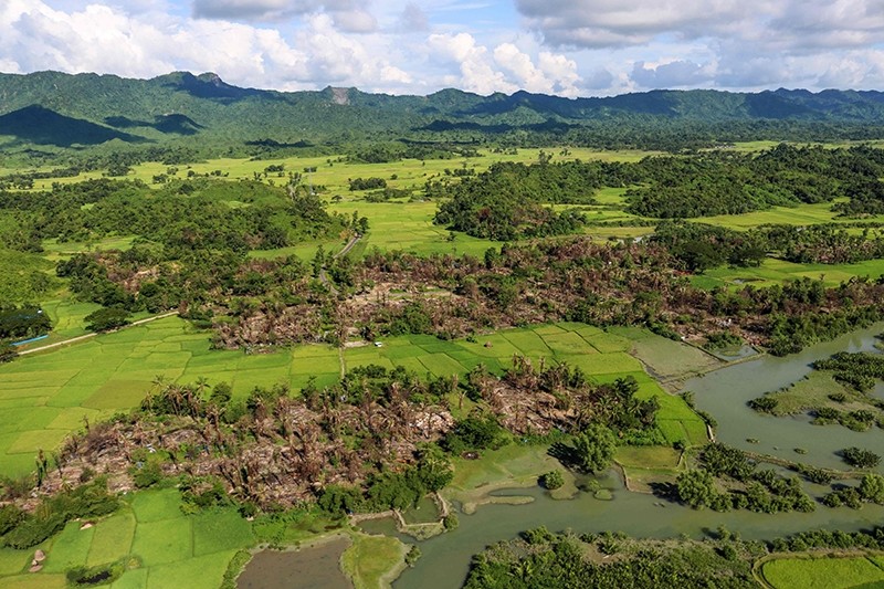 This file photo shows the remains of burnt villages near Maungdaw in Northern Rakhine State (AFP File Photo)