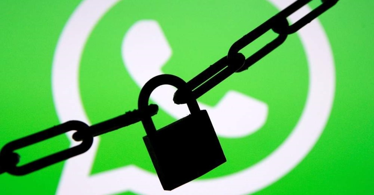 A photo illustration shows a chain and a padlock in front of a displayed Whatsapp logo Jan. 13, 2017. (REUTERS File Photo)