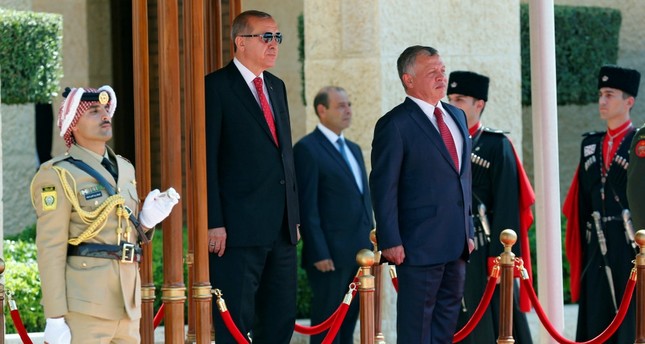 President Erdoğan (L) and Jordan's King Abdullah II (R) review Bedouin honor guards at the Royal Palace in Amman, Jordan, Aug. 21.