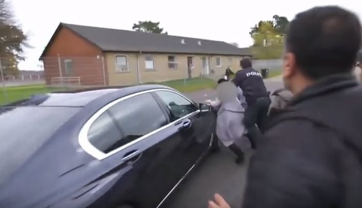 A screenshot from the video published by DR shows the refugee woman being hit by the minister's car.