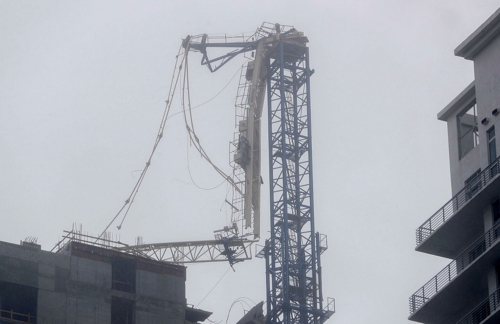 A partially collapsed construction tower crane as Hurricane Irma strikes in Miami, Florida, USA, 10 September 2017. The National Hurricane Center has rated Irma as a Category 4 storm as the eye crosses the lower Florida Keys. (EPA Photo)