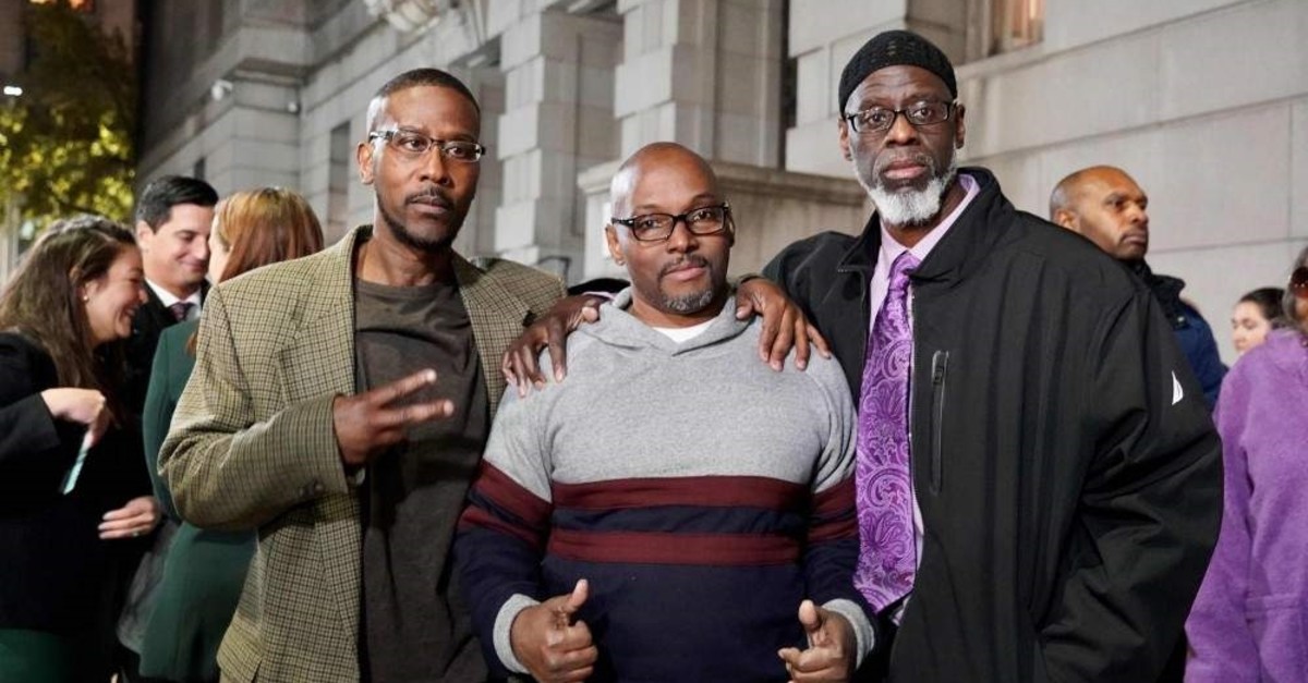 (From L to R) Alfred Chesnut, Andrew Stewart and Ransom Watkins pose for a photo after their liberation in Baltimore on Nov. 25, 2019. (Photo by Todd Kimmelman/MIAP/AFP) 