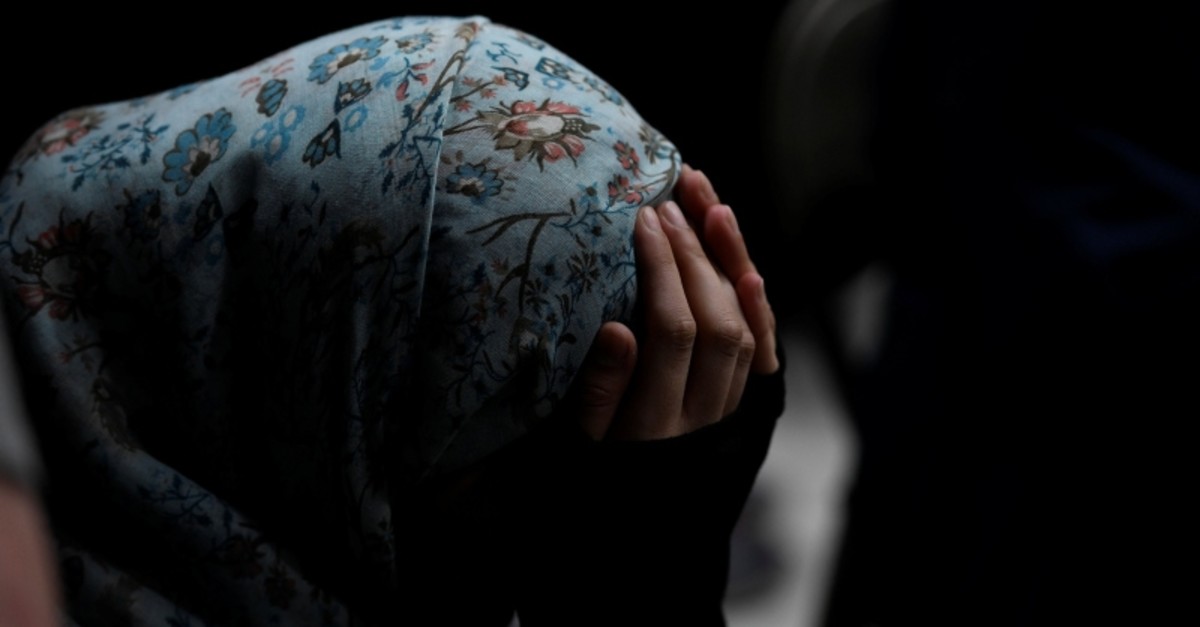 A young woman attends a vigil in honor of New Zealand mosque attack victims at Dar Al-Hijrah Islamic Center in Falls Church, Va., U.S., March 16, 2019. (Reuters Photo)