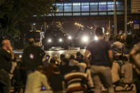 People confront tanks controlled by putschists in Ankara, July 15, 2016.