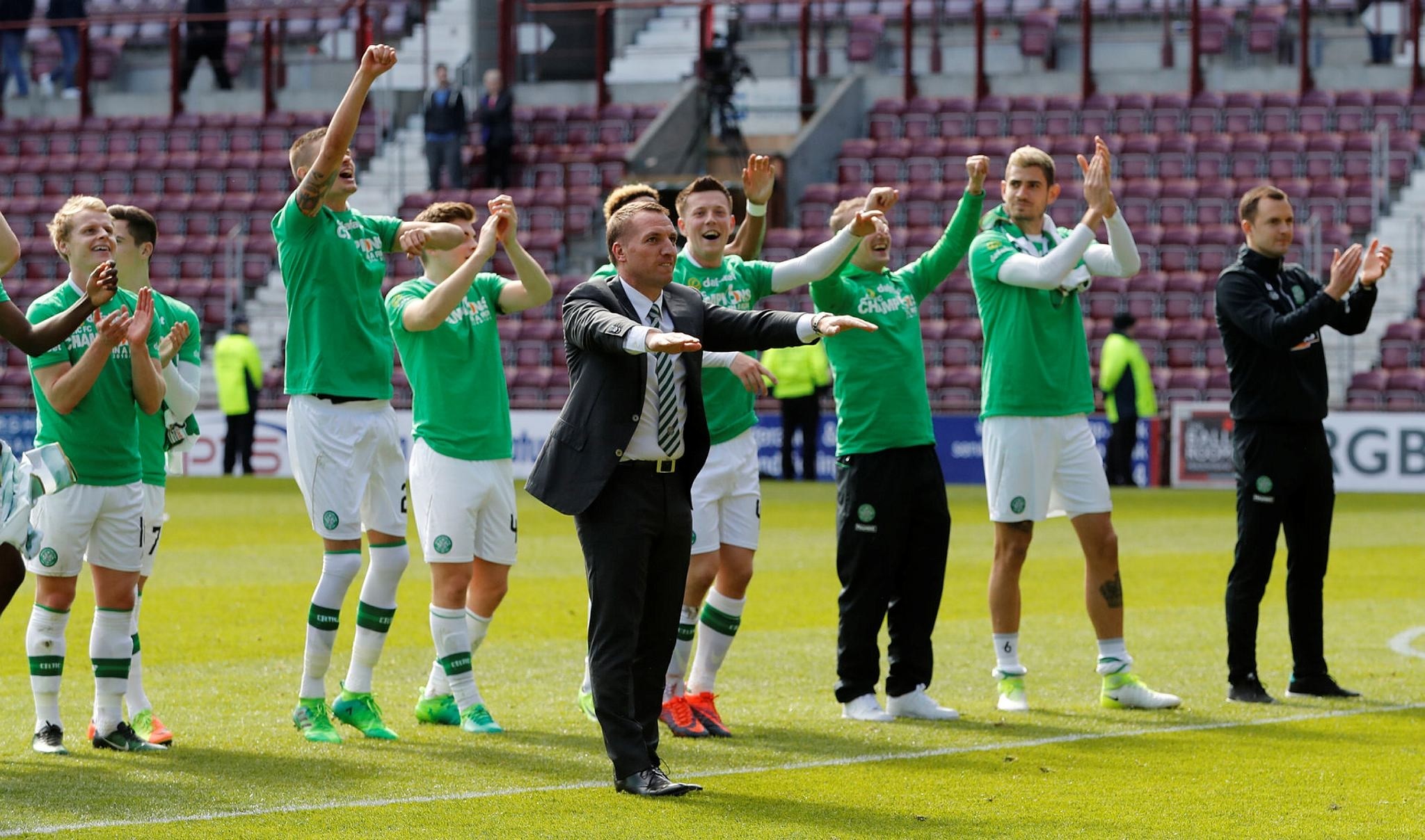 Celtic manager Brendan Rodgers and their players celebrate winning the Scottish Premiership. (Reuters Photo)