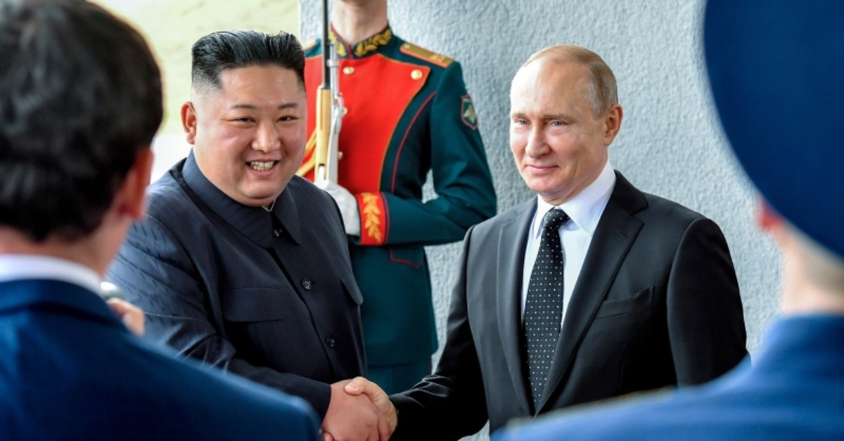 Russian President Vladimir Putin, center right, and North Korea's leader Kim Jong Un shake hands during their meeting in Vladivostok, Russia, Thursday, April 25, 2019. (AP Photo)