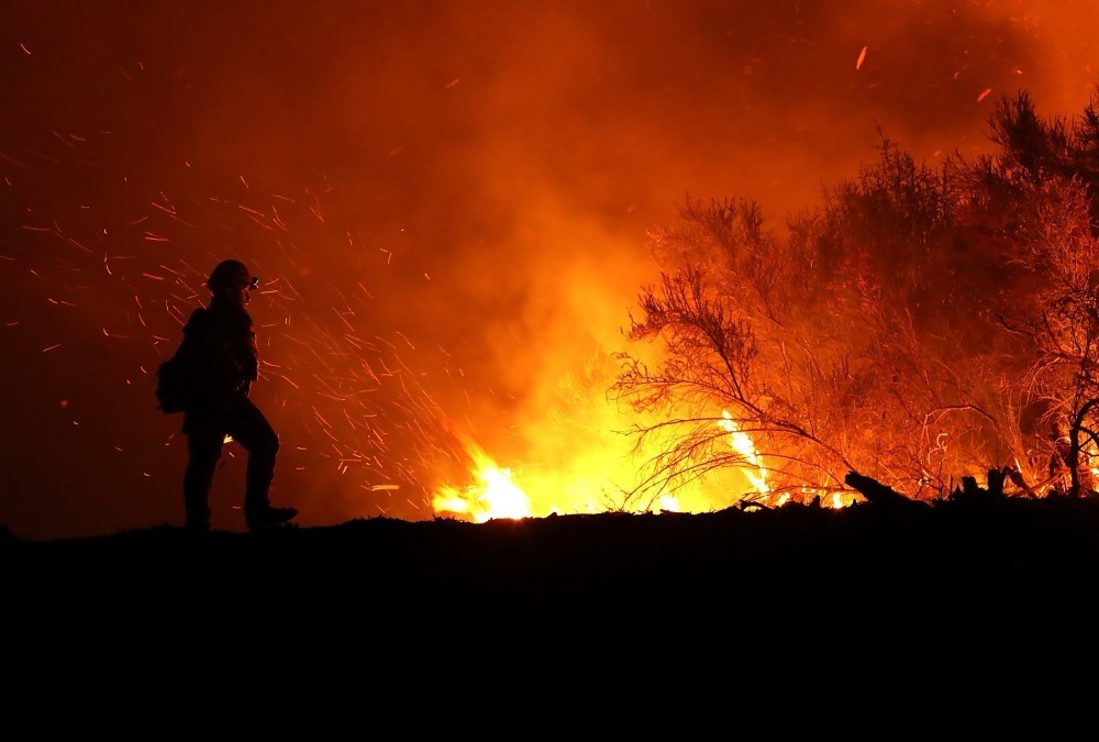 A California firefighter monitors the Medocino Complex fire.