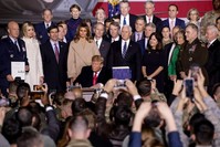 Encircled by top officials of his administration, US President Donald Trump signs $738 billion 2020 National Defense Authorization Act (NDAA) at Joint Andrews Base in Maryland, on Dec. 20, 2019. (AA Photo)