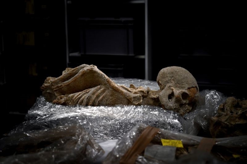One of the skeletons was found with his arms twisted behind his back and may have been a ,prisoner of war, a criminal or a runaway slave,, Prevedorou said. (AFP Photo)