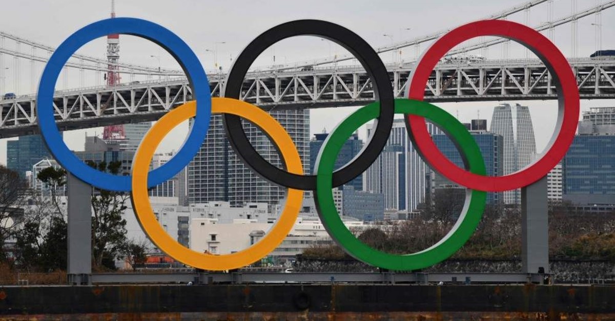 A large Olympic symbol is brought by a salvage barge for installation on Tokyo's waterfront in the waters of Odaiba Marine Park, Jan. 17, 2020. (AFP Photo)