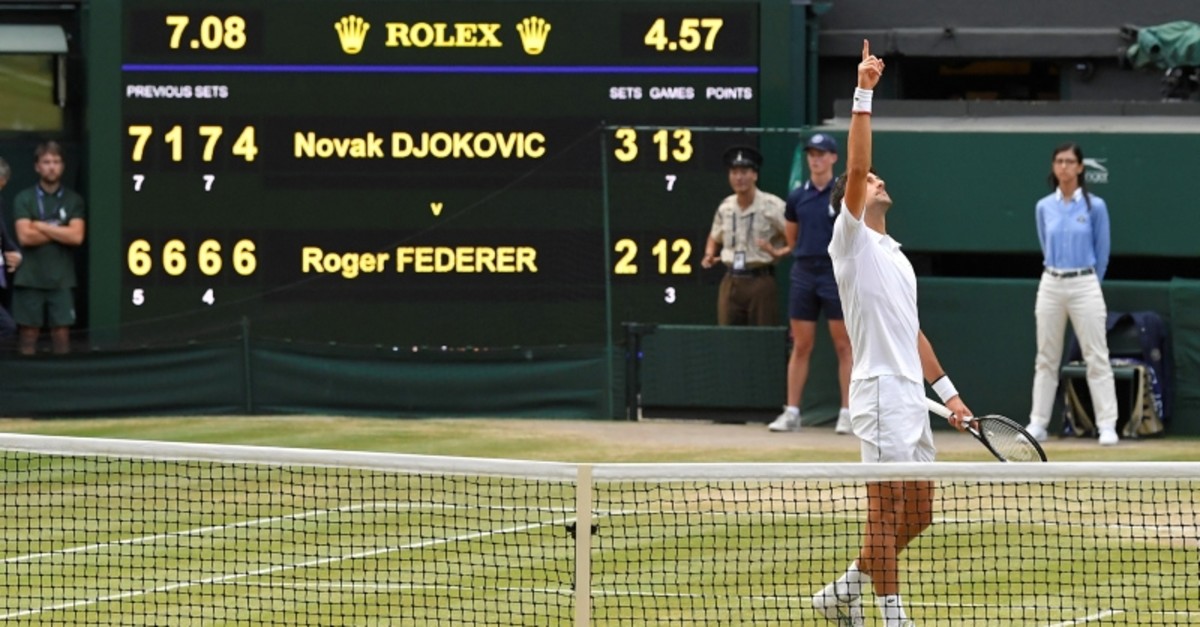 Serbia's Novak Djokovic celebrates winning the final against Switzerland's Roger Federer. (Reuters Photo)