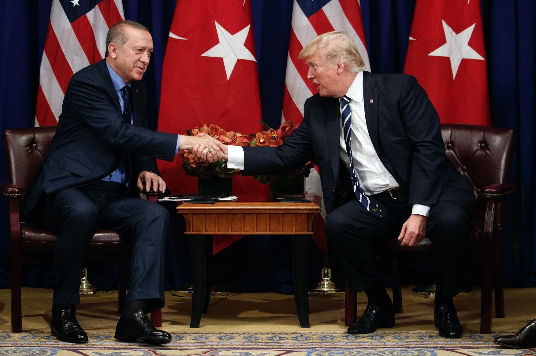 President Erdou011fan (L) shakes hands with U.S. President Trump during a meeting at the Palace Hotel during the United Nations General Assembly, New York, Sept. 21, 2017.
