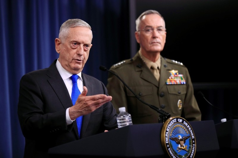 Secretary of Defense Jim Mattis, left, and Chairman of the Joint Chiefs of Staff, Marine Gen. Joseph Dunford speak to reporters during a news conference at the Pentagon, Tuesday, Aug. 28, 2018 in Washington. (AP Photo)