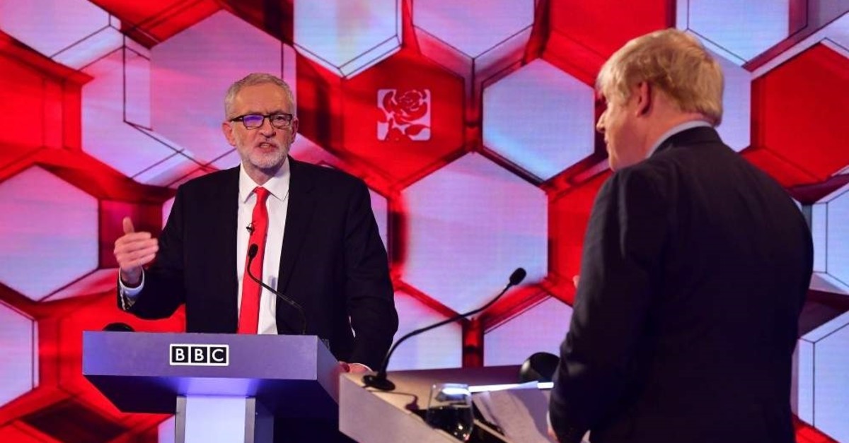 Britain's Prime Minister Boris Johnson (R) and Britain's main opposition Labour Party leader Jeremy Corbyn participate in the BBC Prime Ministerial leaders debate, at the studio in Maidstone, Kent, Dec. 6, 2019. (AFP Photo)