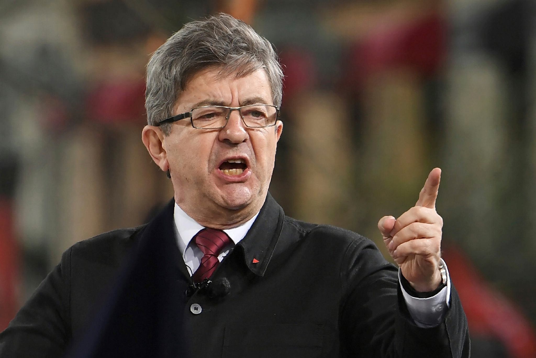 French presidential election candidate for the far-left coalition ,La France insoumise, Jean-Luc Melenchon speaks during a rally following the March for the 6th Republic on March 18, Paris.