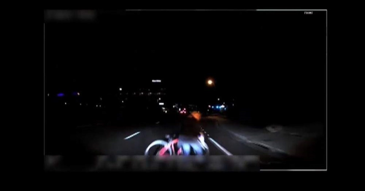 This video grab made from dashcam footage, released by the Tempe Police Department on March 21, 2018 shows the moment before the collision of Uber's self-driving vehicle and a pedestrian in Tempe, Ariz., March 18, 2018. (AFP/Tempe Police Department)