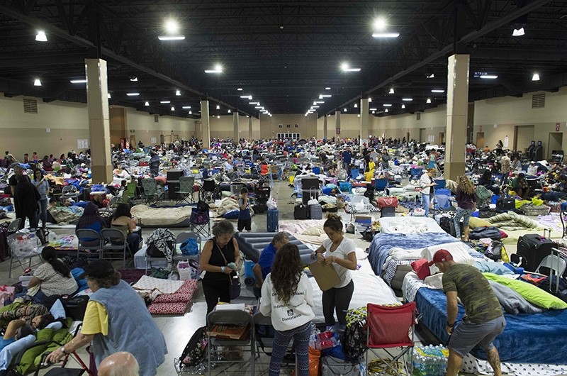 Hundreds of people gather in an emergency shelter at the Miami-Dade County Fair Expo Center in Miami, Florida, September 8, 2017, ahead of Hurricane Irma (AFP Photo)
