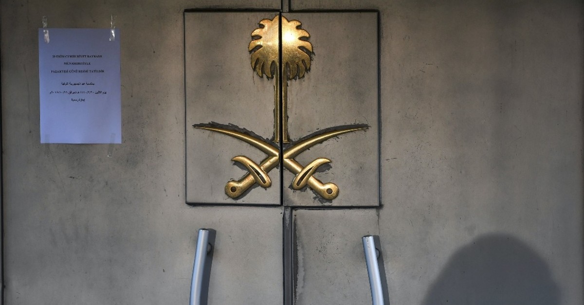 The shadow of a security member is seen on the door of the Saudi Arabian Consulate in Istanbul, Oct. 29, 2018, while the investigation into the murder of Saudi journalist Jamal Khashoggi is underway. 