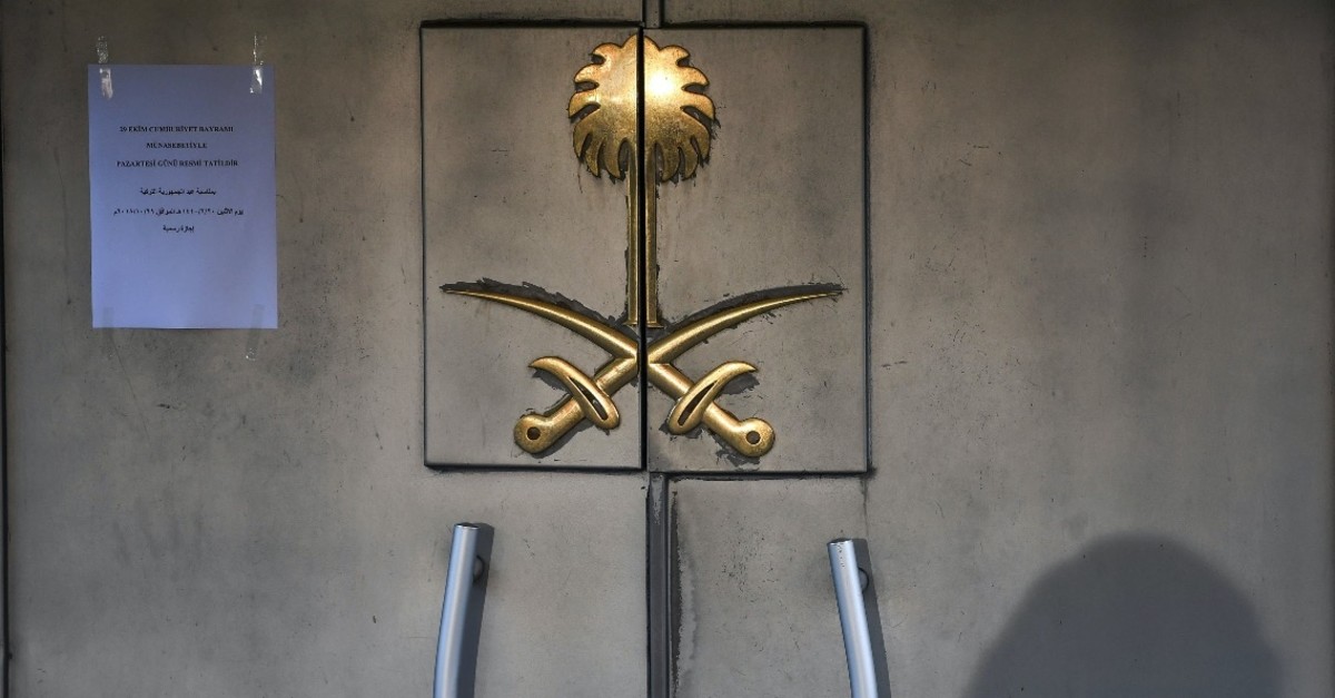 The shadow of a security member is seen on the door of the Saudi Arabian Consulate in Istanbul, Oct. 29, 2018, while the investigation into the murder of Saudi journalist Jamal Khashoggi is underway. 