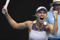 Wozniacki celebrates after defeating Yastremska at the Australian Open, Jan. 22, 2020. (AP Photo)