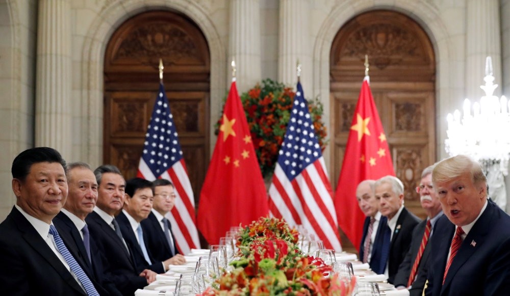 Chinese President Xi Jinping and U.S. President Donald Trump attend a working dinner with their delegation after the G20 summit in Buenos Aries, Argentina, Dec. 1. 