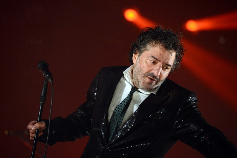 In this file photo taken on December 7, 2012 Algerian singer Rachid Taha performs on stage during the 34th Trans Musicales Music Festival in Rennes, western France. (AFP Photo)