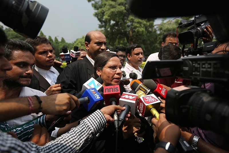 Farha Faiz, a Supreme Court lawyer, speaks to media after the apex court declared ,Triple Talaq,, a Muslim practice that allows men to instantly divorce their wives, unconstitutional in its verdict, in New Delhi, India, Aug. 22, 2017 (AP Photo)