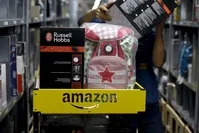 A worker sorts products at an Amazon fulfillment center in Wroclaw, Poland. (Reuters Photo)