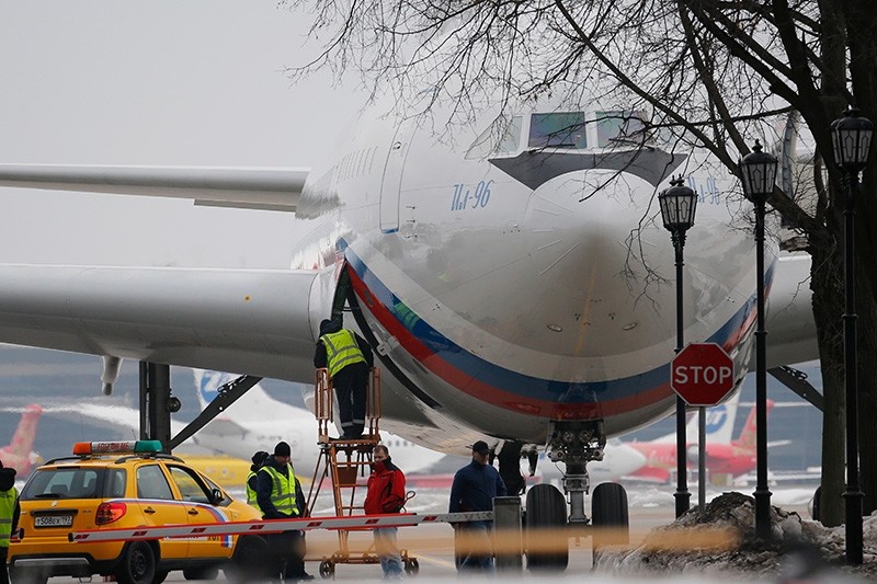 A plane carrying Russian diplomats and their family members ordered to leave the U.S. is parked after landing at Vnukovo 2 government airport outside Moscow, Russia, Sunday, April 1, 2018 (AP Photo)