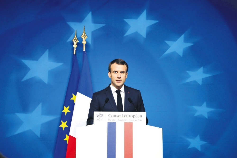 French President Emmanuel Macron speaks at a press conference during an EU summit in Brussels, Dec. 14.
