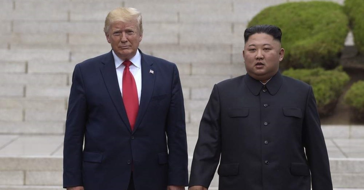 In this June 30, 2019, file photo, U.S. President Donald Trump meets with North Korean leader Kim Jong Un on the North Korean side of the border at Panmunjom village in the Demilitarized Zone. (AP Photo)