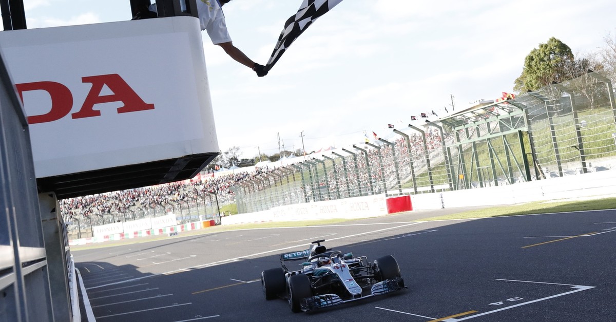 Lewis Hamilton crossing the finish line in last yearu2019s Japanese Grand Prix.