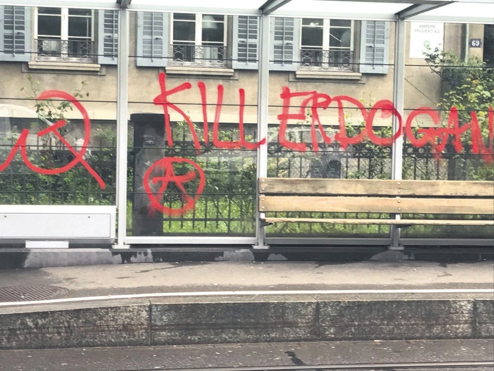 Graffiti reading ,Kill Erdou011fan, on a bus stop near the Turkish Consulate General in Zurich, Switzerland, May 1. On the same day, the consulate was also vandalized with paint. 