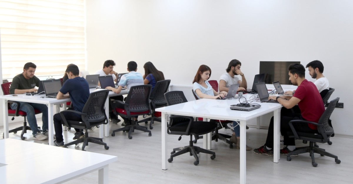 Young engineers working at Cumhuriyet University's technology innovation center in the Central Anatolian province of Sivas, developing software for local and international customers.