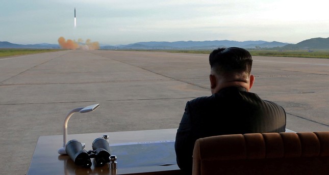 North Korean leader Kim Jong Un watches the launch of a Hwasong-12 missile in this undated photo released by North Korea's Korean Central News Agency on Sept. 16, 2017. (REUTERS Photo)