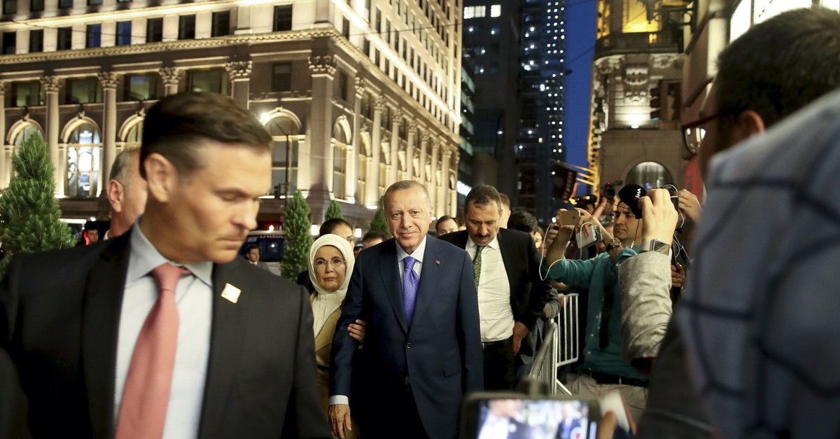 President Recep Tayyip Erdou011fan (C) and his wife, first lady Emine Erdou011fan, are welcomed by Turkish people in New York City, where he has arrived in to attend the U.N. General Assembly, Sept. 21, 2019.