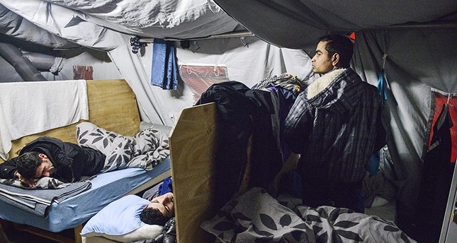 A file photo dated 13 January 2016 showing refugees in their beds at the refugee tent camp in Thisted, Northern Jutland, Denmark. (EPA Photo)