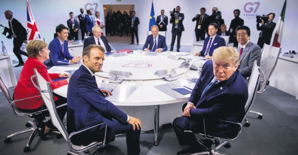The leaders of the G7 members during a session at the G7 summit, Biarritz, France, Aug. 25, 2019.