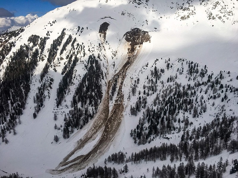 This handout picture taken on March 16, 2018 and released on March 17, 2018 by the Swiss Police of the Canton of Valais shows a general view of an avalanche that swept away four people in Vallon d'Arbi, western Switzerland. (AFP Photo)